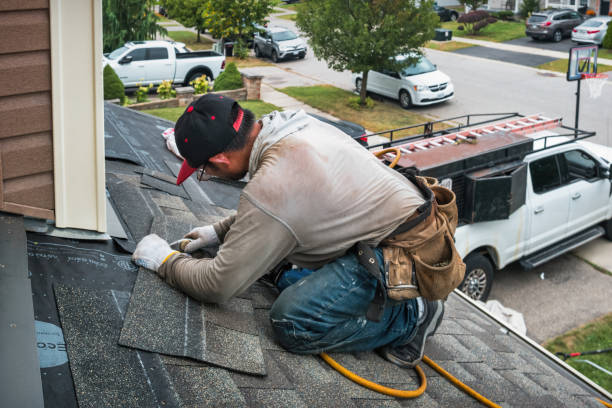 Professional Roof Replacement technician working in Lacygne, KS